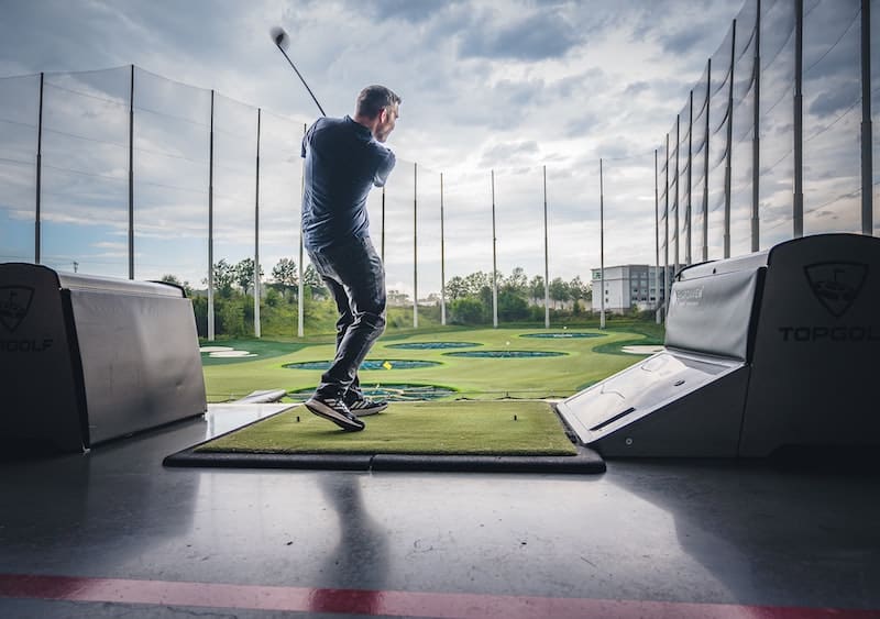 Learning distance control on the driving range.