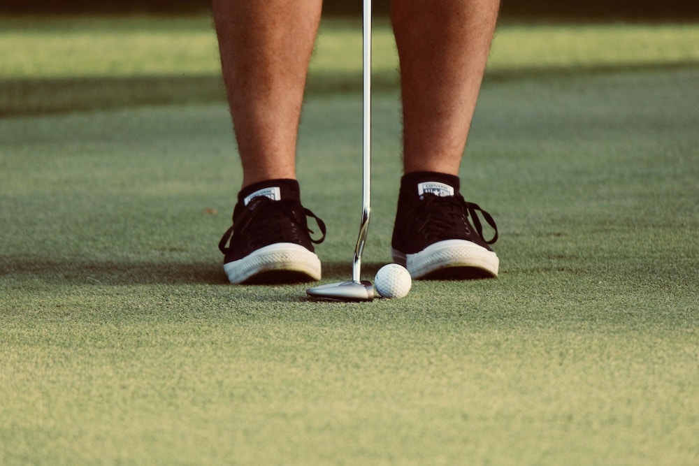 Mastering the Perfect Ball Position When Putting - The Golfing Dad
