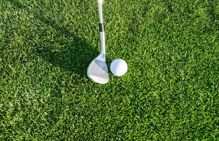Learn how to put backspin on a golf ball.